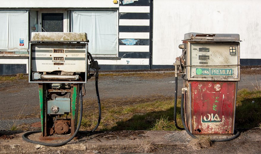 Two decaying petrol pumps