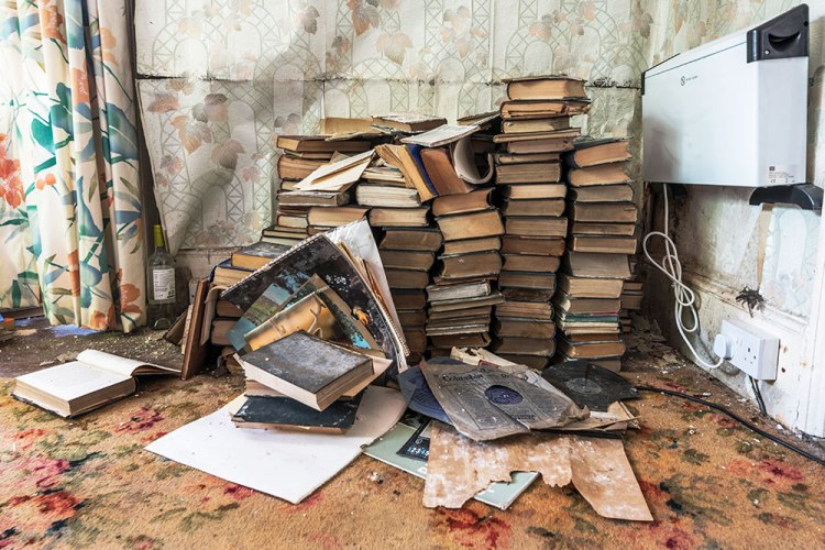 Book pile from An Essence of Presence exhibition