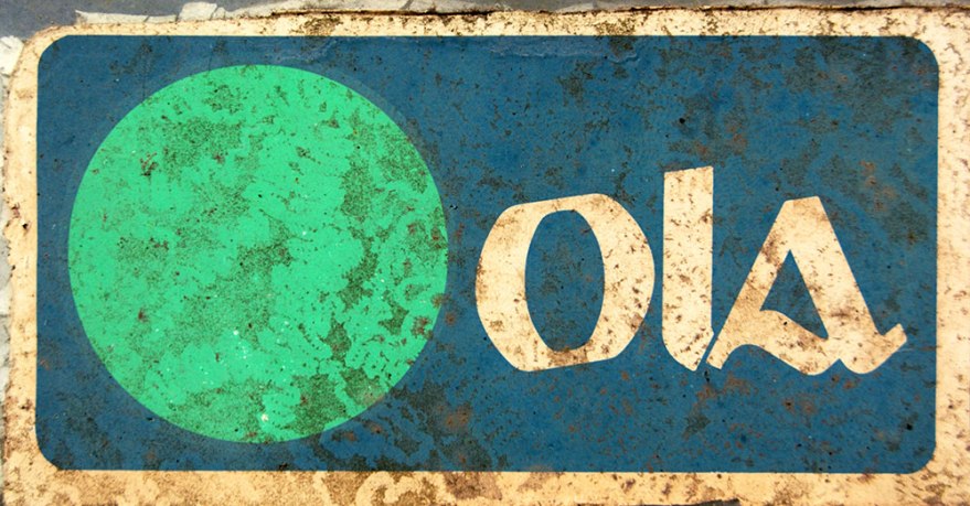 Ola shop sign